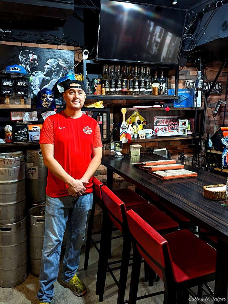 Eddy's Cantina from the inside with a picture of Eddy - bringing Taipei Mexican food for 20 years.